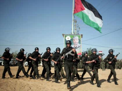 Palestinian Hamas security forces deploy on the Palestinian side of the border with Egypt in Rafah, southern Gaza Strip, Thursday, April 21, 2016. Hamas has deployed forces along the Egyptian-Gaza border to counter Cairo's concerns it is aiding militants from the Islamic State group in Egypt's lawless Sinai Peninsula. (AP …