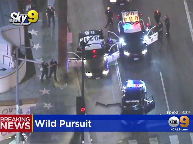 Slow-Speed Chase Ends with Suspect Smoking Cigarette by Hollywood Walk of Fame