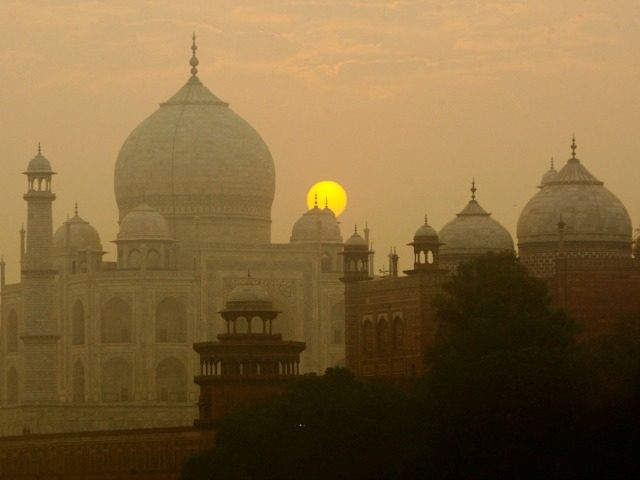 FILE - In this Nov. 18, 2009, file photo, the sun rises over the Taj Mahal in Agra, India.