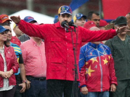 Venezuela's President Nicolas Maduro speaks during an anti-imperialist rally in Caracas, Venezuela, Thursday, March 9, 2017. President Maduro said that the construction of a wall proposed by U.S. President Donald Trump on the U.S. - Mexico border is not against Mexico but against Latin America. (AP Photo/Ariana Cubillos)