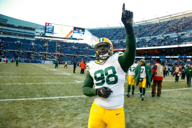Letroy Guion #98 of the Green Bay Packers reacts after the Green Bay Packers win the game