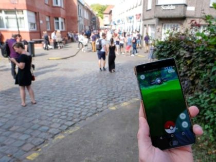 People play at the Pokemon GO augmented reality game on August 20, 2016 in Lillo, a village which harbors rare Pokemon and as been flooded with Pokemon GO hunters since the mobile game launched