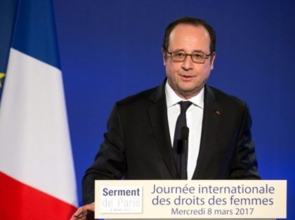 French President Francois Hollande delivers a speech during a meeting as part of the 40th International Women's Day on March 8, 2017, at the French Foreign Affairs Ministry in Paris