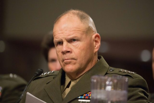 General Robert Neller listens during the Senate Armed Services Committee on Information Surrounding the Marines United Website at the Dirksen Senate Office Building on March 14, 2017
