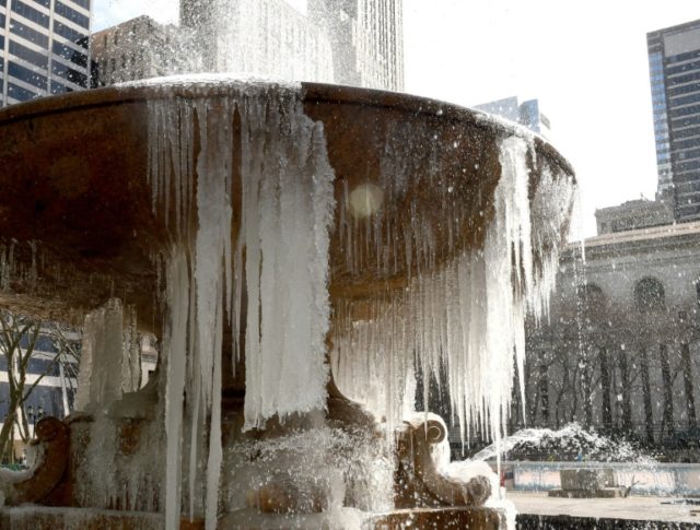 The Josephine Shaw Lowell Memorial Fountain in New York City's Bryant Park is covered in i