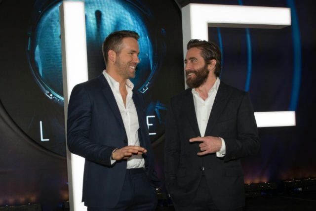 Actors Ryan Reynolds (L) and Jake Gyllenhaal attend the 'Life' premiere during 2017 SXSW C