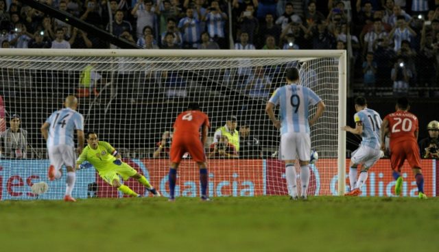 Lionel Messi (2nd R) scores to give Argentina a 1-0 win over Chile in World Cup qualifiers