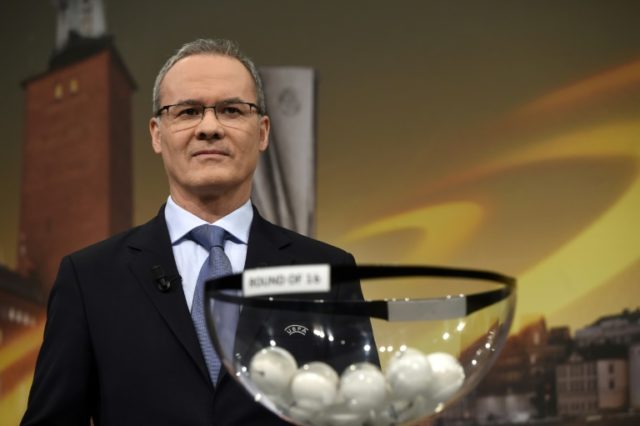 UEFA deputy secretary general Giorgio Marchetti waits to hold the draw for the round of 16