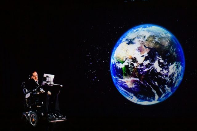 Renowned physicist Stephen Hawking, 75, appears via hologram to address an audience in Hon