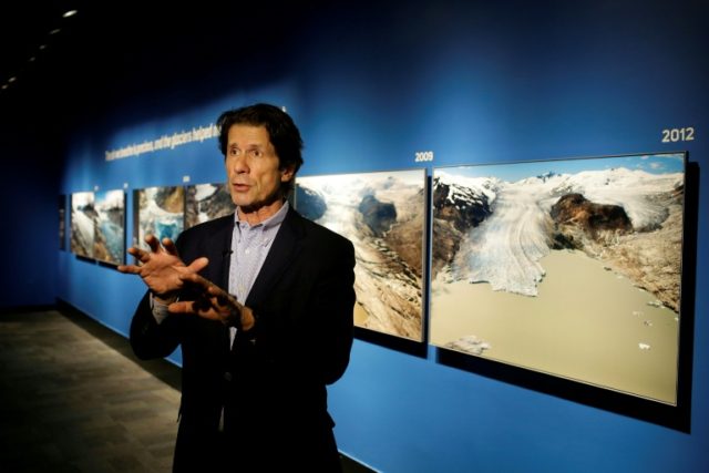 US photographer James Balog speaks about his images at the "Extreme Ice" exhibit at the Mu