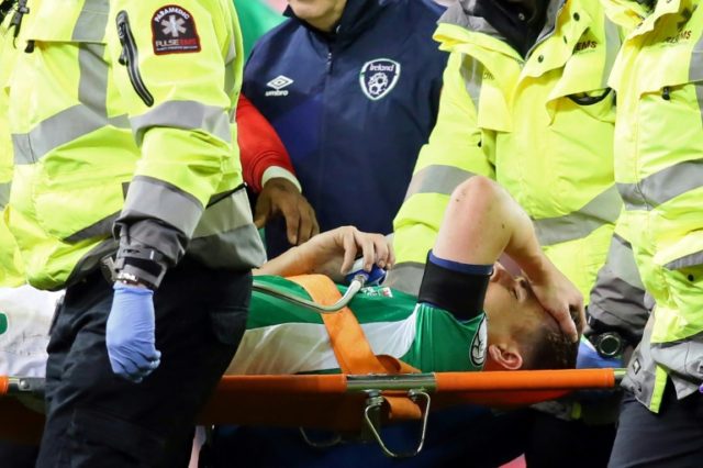 Republic of Ireland's Seamus Coleman is strechered out after a horrific tackle by Wales's