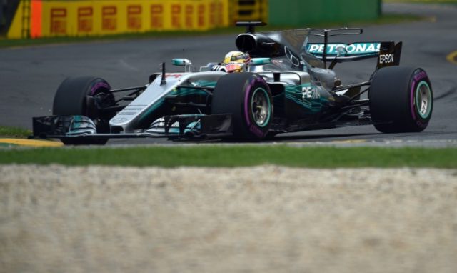 Lewis Hamilton in a Mercedes clocked a record lap of one minute 22.188 seconds to take his