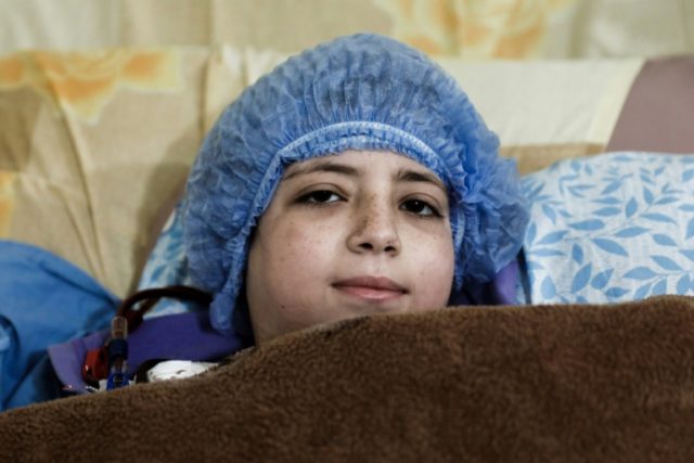 Dania, a 14-year-old Syrian who suffers from renal insufficiency, receives dialysis inside