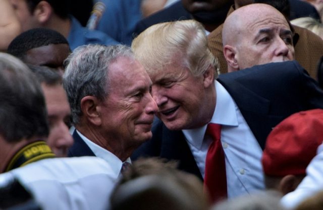 Then US Republican presidential nominee Donald Trump (R) speaks to former New York mayor M