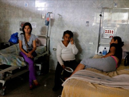 Patients lie on beds at the Universitary Hospital in Merida, Venezuela June 17, 2016. REUT