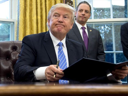 Donald-Trump-Reince-Priebus-Oval-Office-Jan-23-2017-Getty