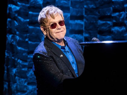 NEW YORK, NY - MARCH 2: Elton John performs during a fundraiser for Democratic presidential candidate Hillary Clinton at Radio City Music Hall on March 2, 2016 in New York City. Clinton won seven states in yesterday's Super Tuesday. (Photo by Andrew Renneisen/Getty Images)
