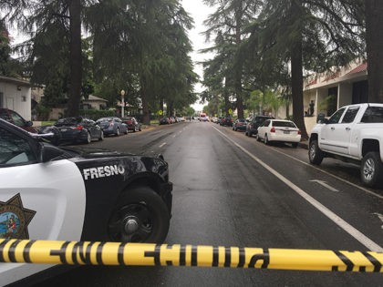 A street is blocked off where emergency officials say a shooting has killed one person and injured two others Tuesday, April 18, 2017, in downtown Fresno, Calif. Dan Lynch of Fresno County Emergency Medical Services says the two wounded by gunfire have been transported to hospitals. A Fresno city spokesman …
