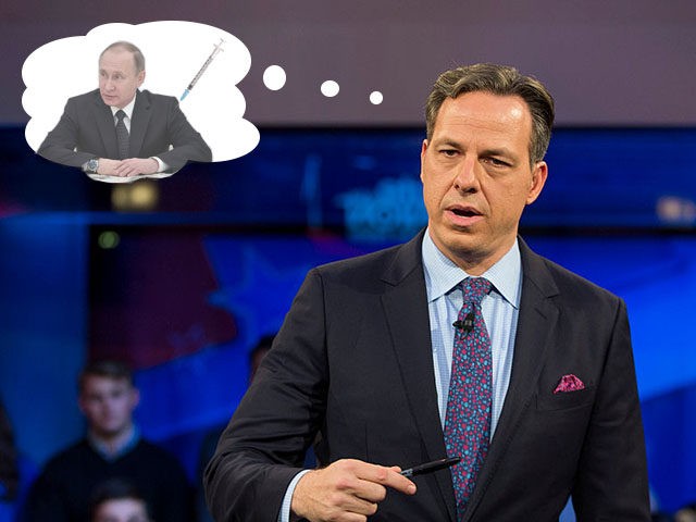 CAMBRIDGE, MA - DECEMBER 01: Jake Tapper, of CNN's State of the Union, speaks to a c