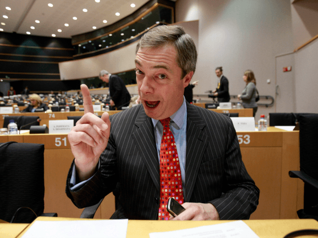 Leader of the UK Independence Party Nigel Farage gestures while speaking during a session