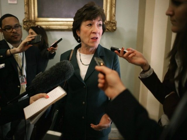 Sen. Susan Collins (R-ME) talks with reporters before heading into the GOP policy luncheons at the U.S. Capitol February 3, 2015 in Washington, DC. Congress is heading for a showdown with the White House as they threaten to cut off funding for the Homeland Security Department in reaction to President …