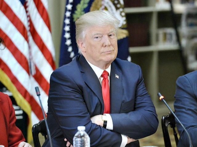 Trump arms crossed Oliver DoulieryGetty