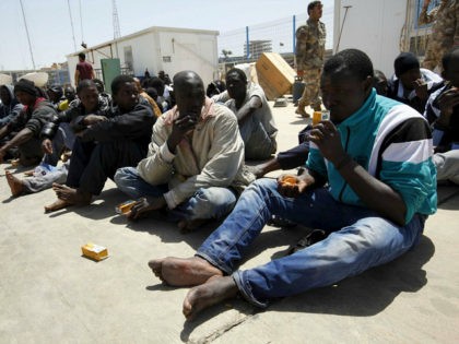 Illegal migrants who attempted to flee the coast to Europe are seen at the Libyan Navy bas