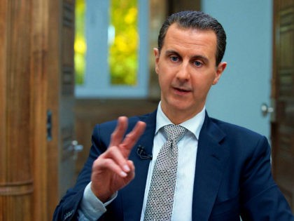 Syria's President Bashar al-Assad speaks during an interview with AFP news agency in Damas