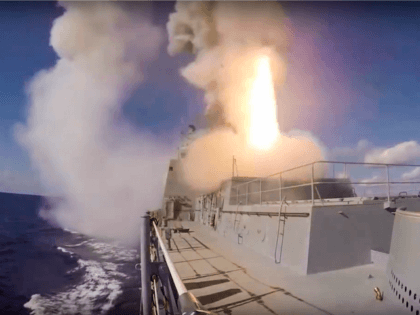 In this photo taken on Tuesday, Nov. 15, 2016 and made from the footage taken from Russian Defense Ministry official web site the Russian Navy frigate Admiral Grigorovich launches a Kalibr cruise missile at a target in Syria from the eastern Mediterranean Sea. The Russian military launched a series of …
