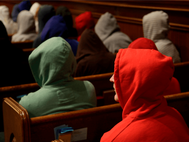 Congregants wear hoodies during a service at Middle Collegiate Church in New York, Sunday,