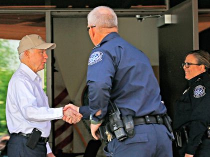 Attorney General Jeff Sessions, left, shakes hands with U.S. Customs and Border Protection