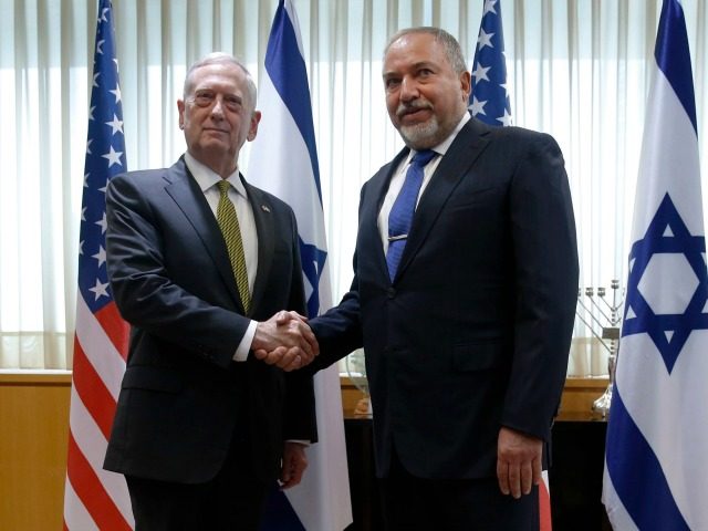 Israel�s Minister of Defense Avigdor Lieberman (R) welcomes U.S. Defense Secretary James