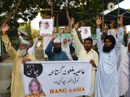 Pakistani protesters shout slogans against Asia Bibi, a Christian woman facing death sentence for blasphemy, at a protest in Karachi on October 13, 2016. Pakistan's Supreme Court delayed an appeal into the country's most notorious blasphemy case on October 13, against a Christian mother on death row since 2010, after …