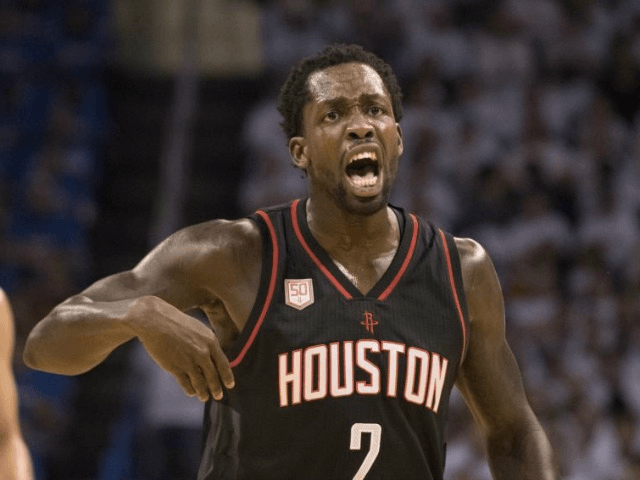 Patrick Beverley of the Houston Rockets reacts after being charged with a foul against the