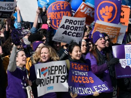 Pro-abortion rights protesters rally outside the Supreme Court in Washington, Wednesday, March 2, 2016. The abortion debate returned to the Supreme Court in the midst of a raucous presidential campaign and less than three weeks after Justice Antonin Scalia’s death. The justices heard the biggest case on the topic in …