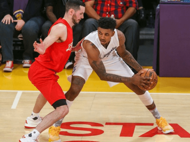 Lakers guard Nick Young vies with Clippers guard J.J. Redick during a game at the Staples