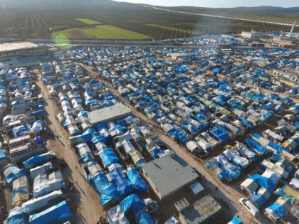 An aerial view shows the Bab al-Salama camp, set up outside the Syrian city of Azaz on Syria's northern border with Turkey on March 23, 2017. / AFP PHOTO / Zein Al RIFAI (Photo credit should read ZEIN AL RIFAI/AFP/Getty Images)