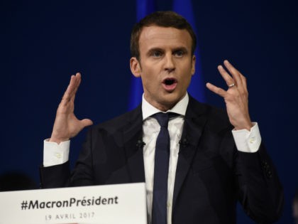 French presidential election candidate for the En Marche ! movement Emmanuel Macron gestures as he delivers a speech during a campaign meeting in Nantes, on April 19, 2017. / AFP PHOTO / JEAN-SEBASTIEN EVRARD (Photo credit should read JEAN-SEBASTIEN EVRARD/AFP/Getty Images)