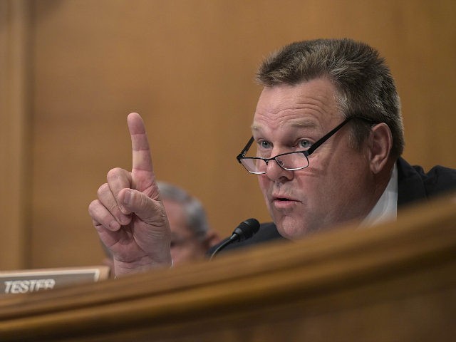 Senate Banking Committee member Sen. Jon Tester, D-Mont., questions Wells Fargo Chief Executive Officer John Stumpf, on Capitol Hill in Washington, Tuesday, Sept. 20, 2016, during the committee's hearing. Stumpf was called before the committee for betraying customers' trust in a scandal over allegations that employees opened millions of unauthorized …