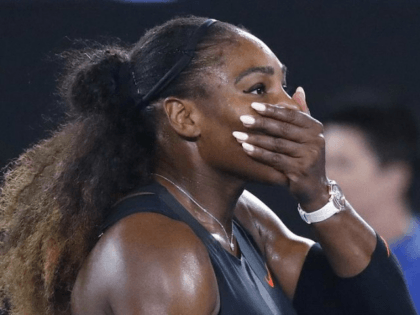 Serena Williams celebrates her victory against Venus Williams during the women's singles f