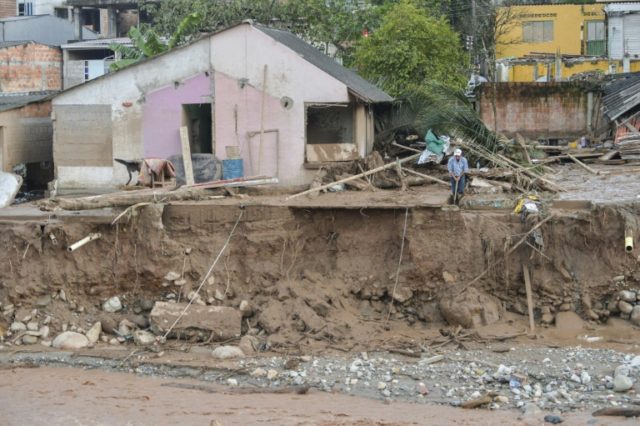 In the southwestern Colombian town of Mocoa a sudden surge of mud and water swept away hom