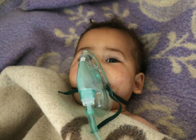 A Syrian child receives treatment following a suspected toxic gas attack in Khan Sheikhun,