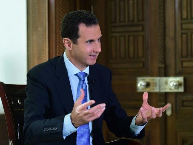 "I think what happened in Syria is a disgrace to humanity, and he's there, and I guess he's running things, so I guess something should happen," US President Donald Trump said of Syrian leader Bashar al-Assad, seen in 2016