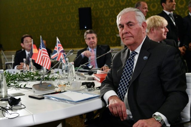 US Secretary of State Rex Tillerson (front) will fly to Moscow after he has concluded talk