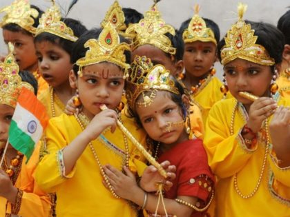 Schoolchildren dressed as Hindu gods Lord Krishna and Radha reenact the Mahabharata mythology in Amritsar, northern India on August 13, 2009, the eve of the 'Janmashtami' festival