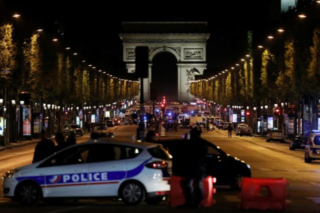 The gunman opened fire on a police van just a few hundred metres from the iconic Arc de Tr