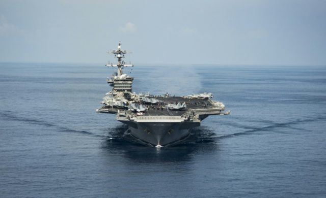Washington has sought to clarify the whereabouts of the USS Carl Vinson (pictured) after U