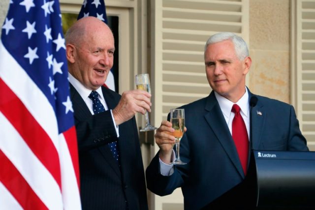 US Vice President Mike Pence (R) and Australia's Governor General Peter Cosgrove toast eac