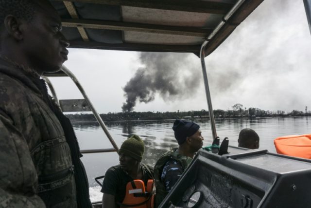 Nigerian Navy forces on the lookout for illegal oil refineries in the Niger Delta region s