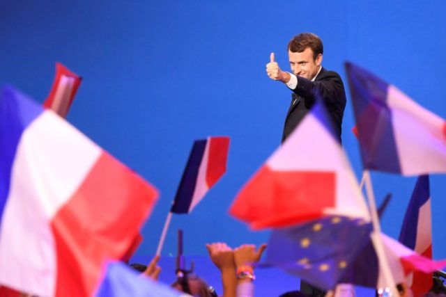 Investors breathed a huge sigh of relief as moderate candidate Emmanuel Macron looked on c